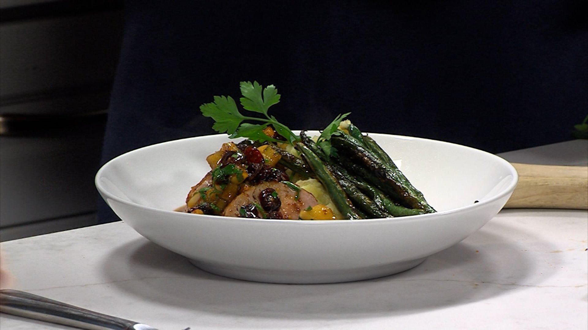 Pan Seared Pork with Seasonal Ingredients is what Benvenuto Restaurant's Chef Zeus is Cooking